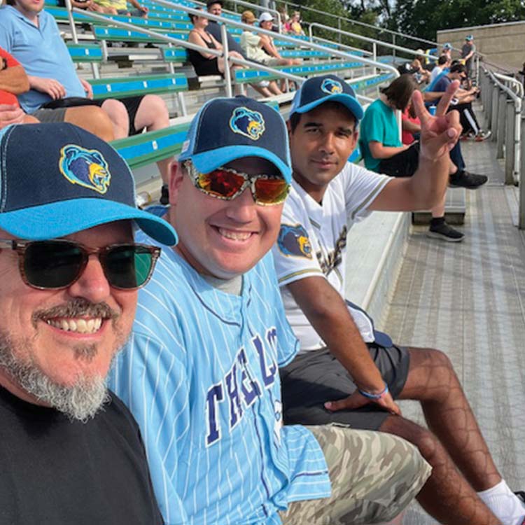 arc members enjoy a sunny summer day at the growlers ballpark